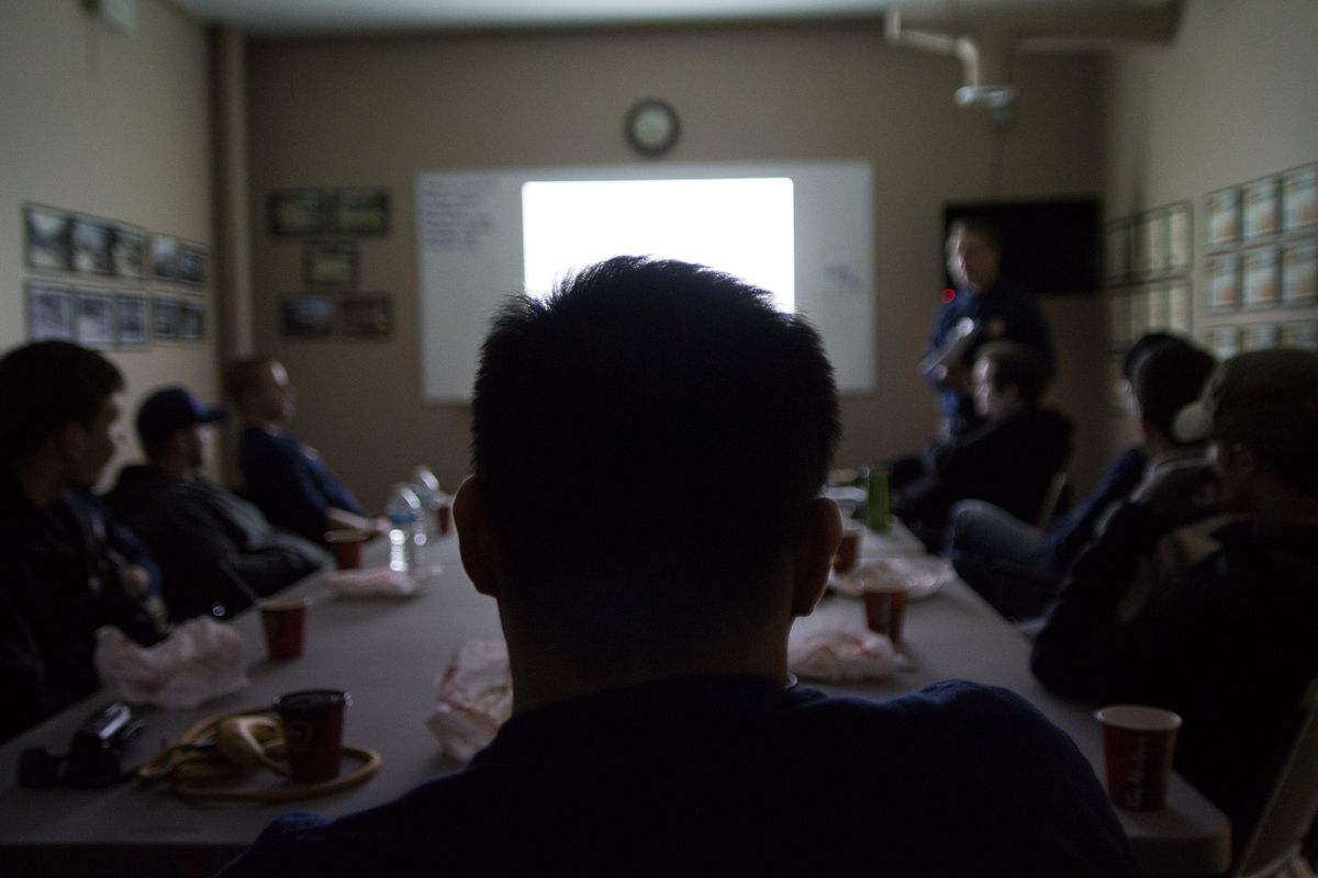 Members in a classroom training session at the hall