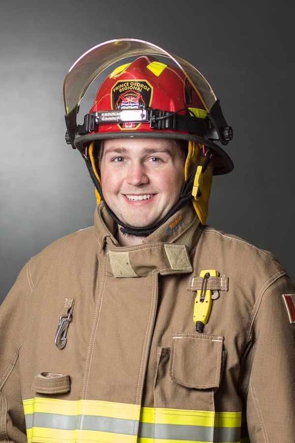 Portrait of a Highway Rescue member in helmet and bunker gear